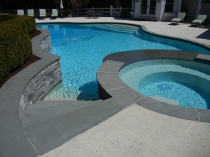 Bluestone pool coping, stack stone, granite pavers