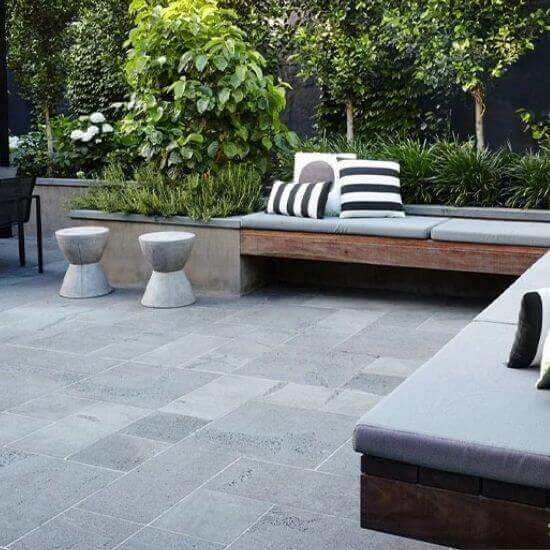 European bluestone pavers laid in an outdoor seating area.